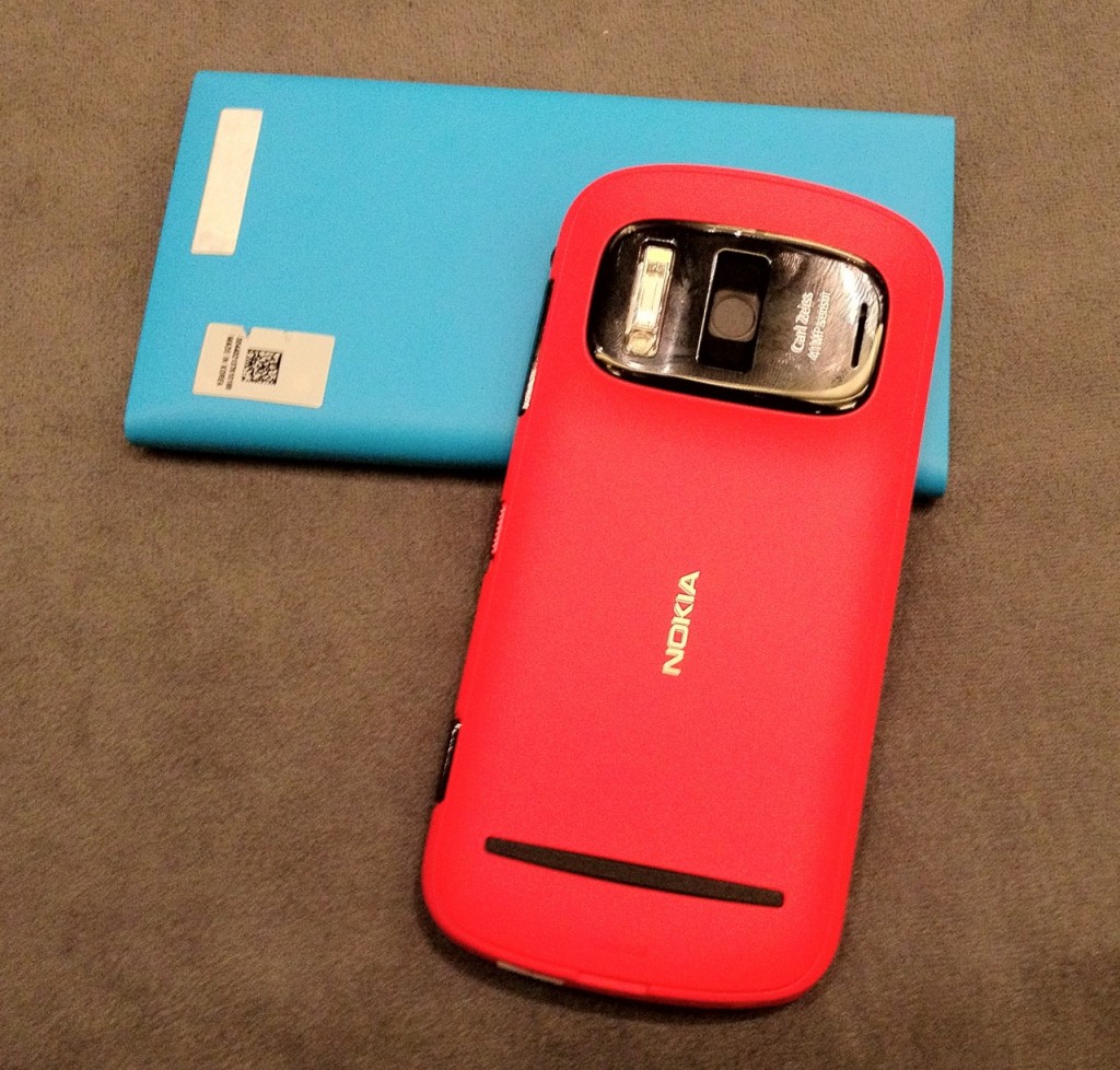 The vibrant red Nokia 808 against a contrasting cyan Lumia 900